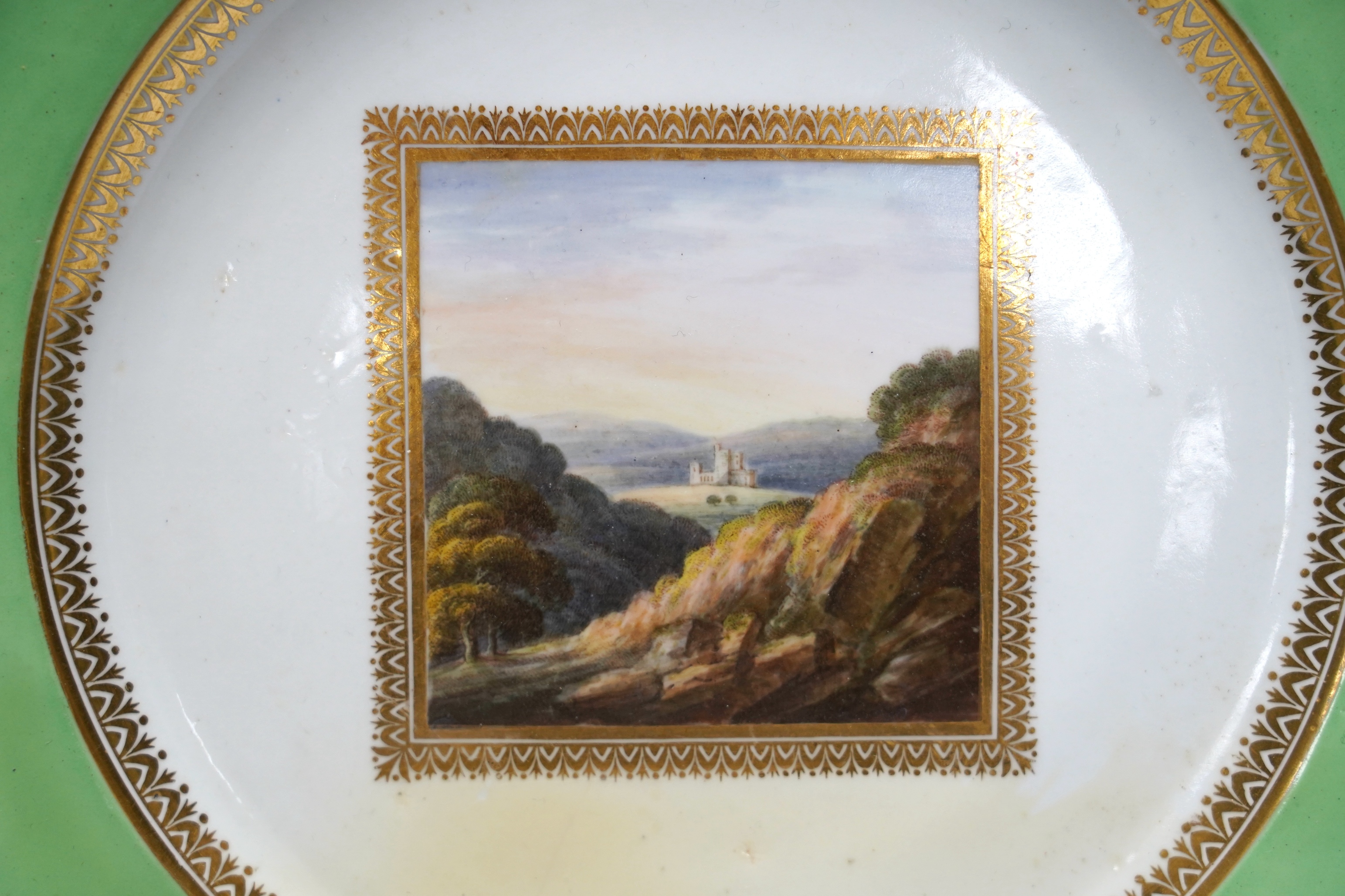 Three Derby landscape plates, attributed to George Robertson, c.1795, two decorated with Scottish scenes, the other Italian scene and a Chamberlains Imari pattern plate, 25cm (4)